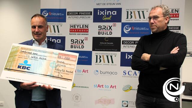 Rotary cheque To Walk Again 
